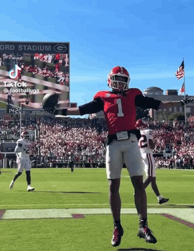 Football Player Number 1 Jumping in Air