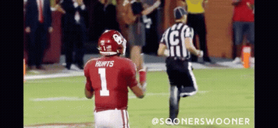 Football Player Number 1 Runs Toward Referee GIF