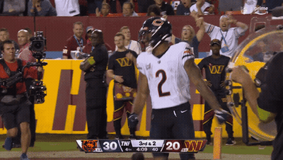 Football Player Number 10 Being Tackled GIF