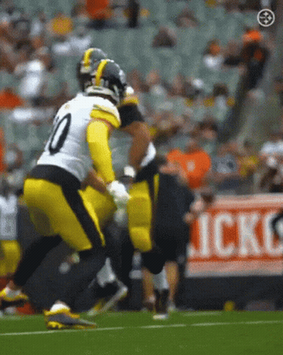 Football Player Number 10 Being Tackled GIF