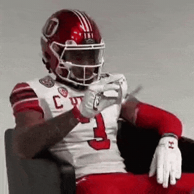 Football Player Number 10 Being Tackled GIF