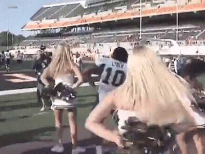 Football Player Number 10 Cheered By Cheerleaders GIF