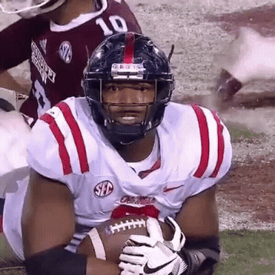 Football Player Number 10 Holding Football GIF