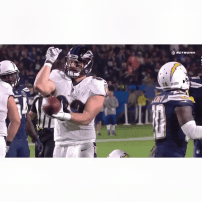 Football Player Number 10 Holding Football GIF