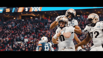 Football Player Number 10 Hugged By Teammates GIF