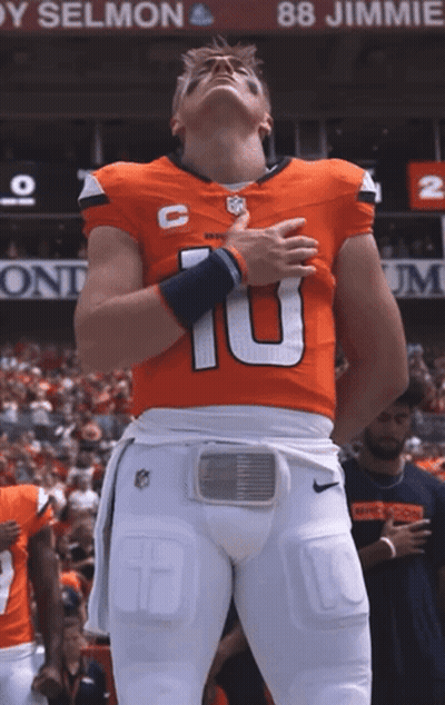 Football Player Number 10 In Front Of Jimmie Banner GIF
