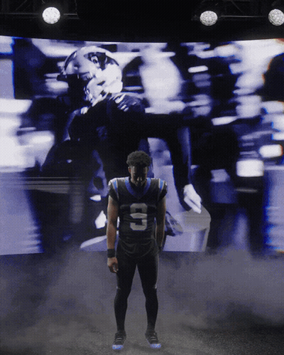 Football Player Number 10 In Front Of Screen GIF
