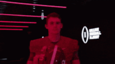 Football Player Number 10 Putting On Helmet GIF