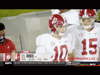 Football Player Number 10 Putting On Helmet GIF
