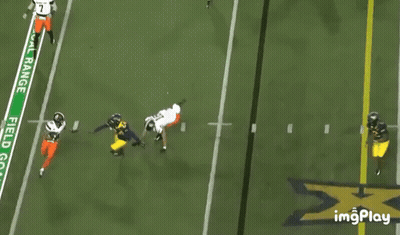 Football Player Number 10 Running On Field GIF