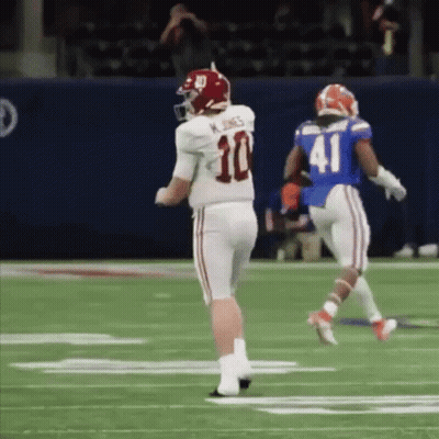Football Player Number 10 Running On Field GIF