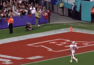 Football Player Number 10 Running On Field GIF