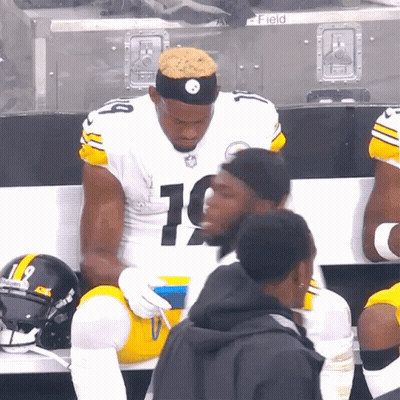 Football Player Number 10 Sitting On Bench GIF