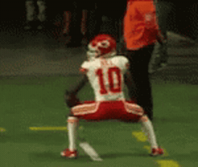 Football Player Number 10 Squatting GIF