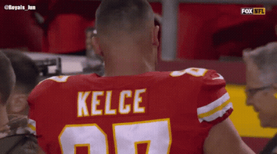 Football Player Number 10 Squatting On Field GIF