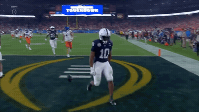 Football Player Number 10 Standing On Field GIF