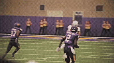 Football Player Number 10 Standing On Field GIF