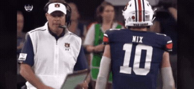Football Player Number 10 Talking To Coach GIF