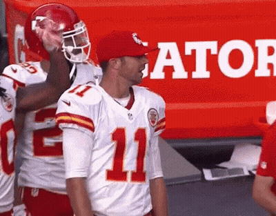 Football Player Number 11 In Front Of Gatorade Sign GIF