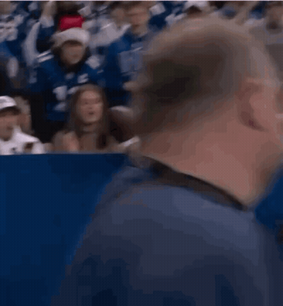 Football Player Number 11 Jersey Next To Woman GIF