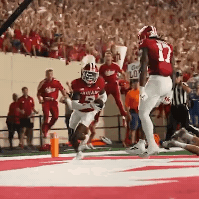 Football Player Number 11 Running With Ball GIF