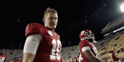 Football Player Number 12 On Field GIF