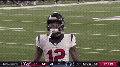 Football Player Number 12 On Field GIF