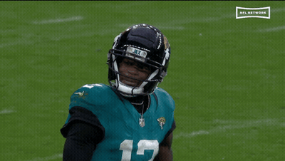 Football Player Number 12 On Field GIF
