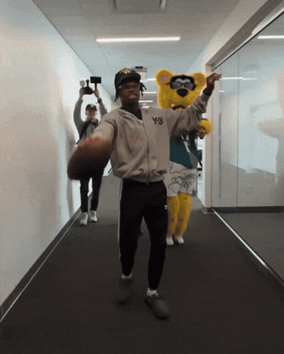 Football Player Number 12 On Field GIF