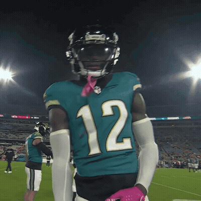 Football Player Number 12 On Field GIF