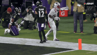Football Player Number 12 Running On Field GIF