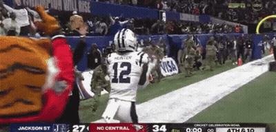 Football Player Number 12 Running On Field GIF