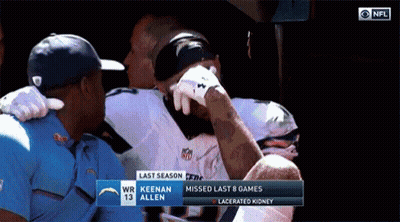 Football Player Number 13 Helped Off Field GIF