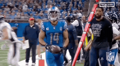 Football Player Number 14 Flexing Muscles GIF