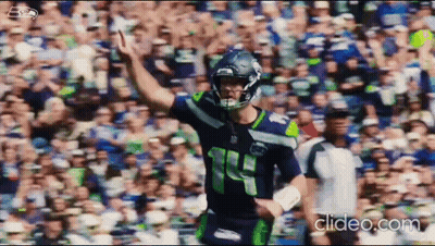 Football Player Number 14 Standing On Field GIF