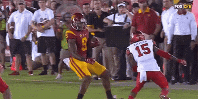 Football Player Number 15 Being Tackled GIF