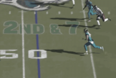 Football Player Number 15 Laying On Ground GIF