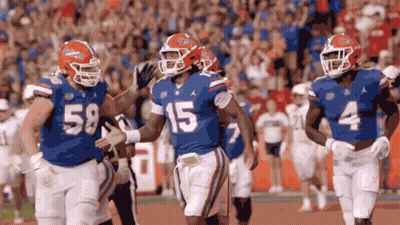 Football Player Number 15 Running On Field GIF