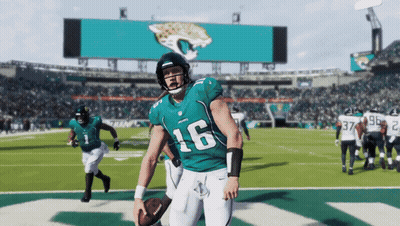Football Player Number 16 Holding Football GIF