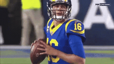 Football Player Number 16 Holding Football GIF