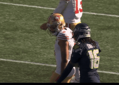 Football Player Number 16 Next To Another Player GIF
