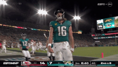 Football Player Number 16 On Field GIF