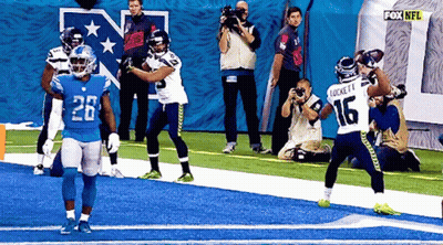 Football Player Number 16 Running GIF