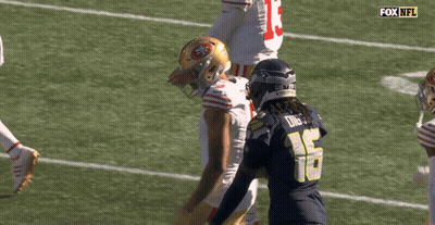 Football Player Number 16 Talking To Another GIF