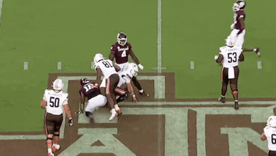 Football Player Number 18 Being Tackled GIF