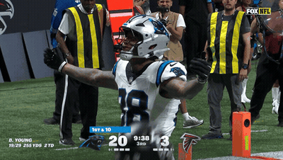 Football Player Number 18 On Field GIF