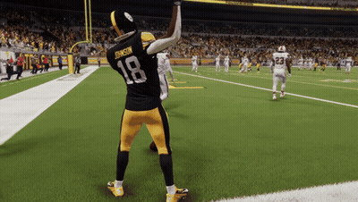 Football Player Number 18 On Field GIF