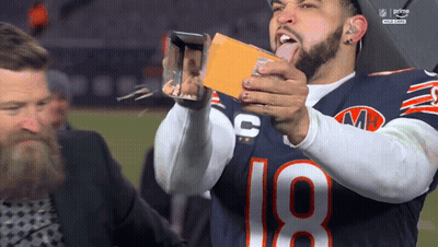 Football Player Number 18 Taking Picture With Phone GIF
