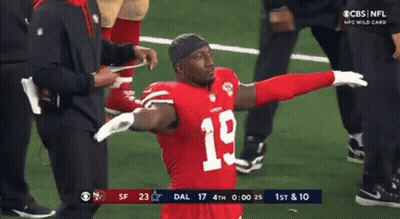 Football Player Number 19 With Arms Outstretched GIF