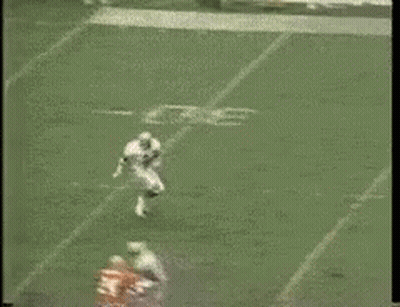 Football Player Number 2 Being Tackled GIF
